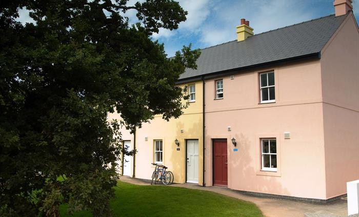 An image of Bluestone's cosy cottages - situated within the village and only a short walk from the award-winning Well Spa.